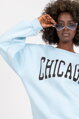 Svetlomodrá mikina s nápisom Chicago
